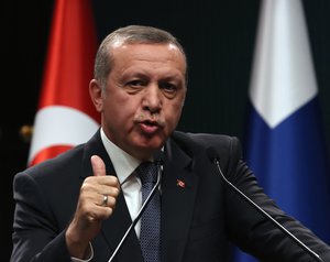 Turkish President Recep Tayyip Erdogan speaks to the media during a joint news conference with his Finnish counterpart Sauli Niinisto in Ankara, Turkey, Tuesday, Oct. 13, 2015. Erdogan said Tuesday his country has intelligence suggesting that militants “originating” from Syria were planning to carry out attacks in Turkey but said no terrorist group is being ruled out in the investigation into the weekend’s deadly blasts at a peace rally