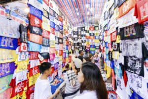 You'll find cheap knock-offs and souvenirs in the buzz at the Temple Street Night Market.