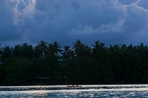 Canoeing in the Marovo Lagoon, Solomon Islands.