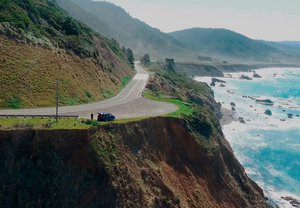 In this March 28, 2018 aerial file image from Alameda County Sheriff's Office drone video courtesy of Mendocino County shows the pullout where the SUV of Jennifer and Sarah Hart was recovered off the off Pacific Coast Highway 1, near Westport, Calif.