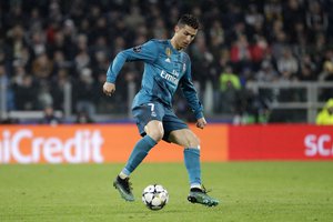 Real Madrid's Cristiano Ronaldo controls the ball during the Champions League, round of 8, first-leg soccer match between Juventus and Real Madrid at the Allianz stadium in Turin, Italy, Tuesday, April 3, 2018.