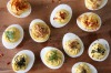 Retro favourite: Devilled eggs, topped with caviar, of course <a ...