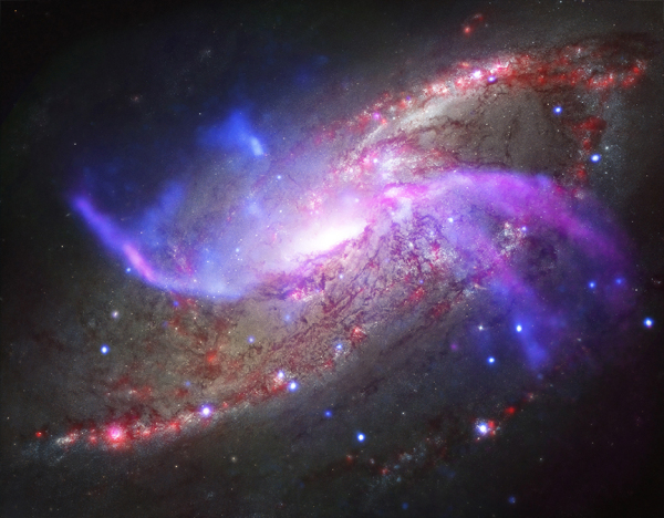 A spiral galaxy, also known as M106, about 23 million light years from Earth.