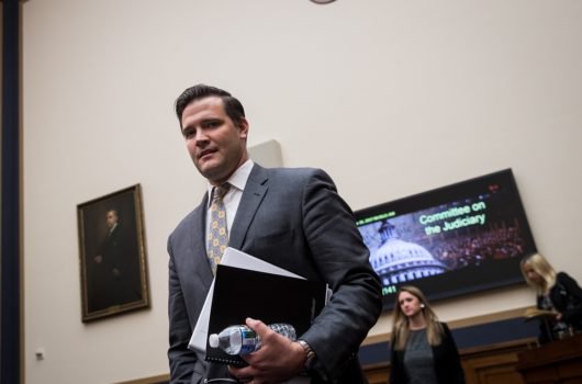 [Photo: Scott Lloyd, director of the Office of Refugee Resettlement at the U.S. Department of Health and Human Services, arrives for a House Judiciary Committee hearing concerning the oversight of the U.S. refugee admissions program]