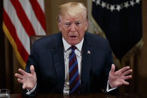 President Donald Trump speaks during a meeting with governors and lawmakers in the Cabinet Room of the White House, Thursday, April 12, 2018, in Washington.