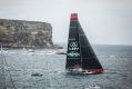 LDV Comanche crosses Sydney Heads after the start of the 2017 Sydney to Hobart Yacht Race.