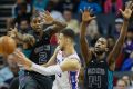Ben Simmons takes on a pair of Hornets in the 76ers' win over Charlotte.