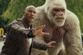 Dwayne Johnson as Davis Okoye and Jason Liles as George in Rampage.