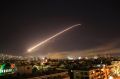 Damascus sky lights up with service to air missile fire as the U.S. launches an attack on Syria targeting different ...