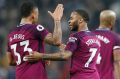 Gabriel Jesus celebrates with Raheem Sterling.