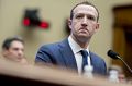 Mark Zuckerberg, chief executive officer and founder of Facebook Inc., listens during a House Energy and Commerce ...