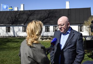 Russia's Ambassador to the United Nations Vassily Nebenzia talks to journalists as the UN Security Council hold a meeting at Backakra outside Ystad, southern Sweden on Saturday April 21, 2018.