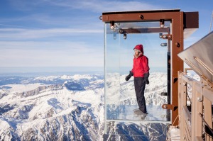 'Step into the Void' glass box on the Aiguille Du Midi mountain top above Chamonix Mont-Blanc.