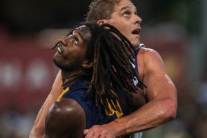 Nic Naitanui of the Eagles (left) and Aaron Sandilands of the Dockers contest a high ball during the Round 3 AFL match ...