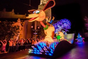 Slinky Dog and Woody from Toy Story in the Paint the Night parade.