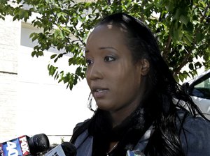 Ina Rogers talks with reporters Monday, May 14, 2018, in Fairfield, Calif. Authorities removed Rogers' 10 children who were living at the home on March 31, and placed them in protective custody after one of them ran away.