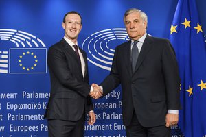 European Parliament President Antonio Tajani, right, welcomes Facebook CEO Mark Zuckerberg upon his arrival at the EU Parliament in Brussels on Tuesday, May 22, 2018.