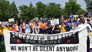 People participate in the "Poor People's Campaign: A National Call for Moral Revival" on Capitol Hill in Washington, Monday, May 14, 2018.