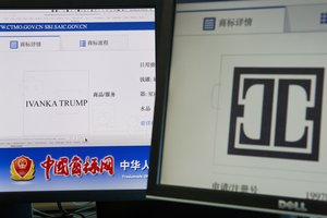 Computer screen shows the Ivanka Trump logo at right and the website of the  Chinese Trademark Office at left in Beijing, China, Monday, May 28, 2018. (AP Photo/Ng Han Guan)