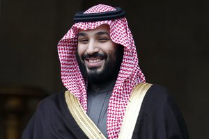 FILE- In this April 9, 2018 file photo, Saudi Arabia Crown Prince Mohammed bin Salman is welcomed by French Prime Minister Edouard Philippe in Paris, France.