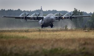 A US Air Force C-130 transport aircraft from the 173rd Airborne Brigade takes off during a military exercise 'Iron Wolf 2016' at the Rukla military base some 130 km. (81 miles) west of the capital Vilnius, Lithuania, Wednesday, June 15, 2016.