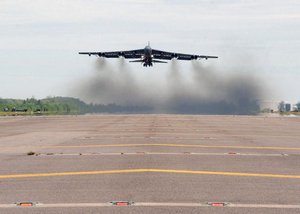 A US Air Force (USAF) B-52 Stratofortress bomber takes off for its home base from a forward operating location, in support of Operation IRAQI FREEDOM. 		 		%lt;table