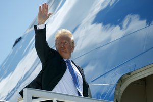 President Donald Trump boards Air Force One for a trip to Singapore to meet with North Korean leader Kim Jong Un, Saturday, June 9, 2018, at Canadian Forces Base Bagotville, in Canada.