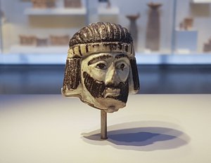 This Monday, June 4, 2018 photo shows a detailed figurine of a king's head on display at the Israel Museum, dating to biblical times, and found last year near Israel's northern border with Lebanon, in Jerusalem.