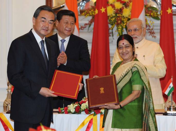 Shri Modi and Chinese President address at a Press Briefing and witness signing of agreements between both the countries. 