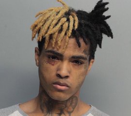 File - Mugshot of rapper XXXTENTACION, October 2016. The rapper was shot and killed on June 18, 2018, in South Florida. Another rapper, Jimmy Wopo, was also shot dead hours later in Pittsburgh.