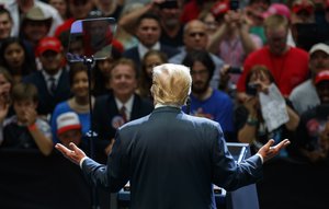 President Donald Trump speaks at the North Side Gymnasium in Elkhart, Ind., Thursday, May 10, 2018, during a campaign rally.