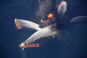 In this April 21, 2010, file photo, the Deepwater Horizon oil rig burns in the Gulf of Mexico following an explosion that killed 11 workers and caused the worst offshore oil spill in the nation's history.