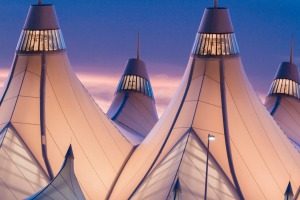 The glowing tents of Denver International Airport at sunrise.