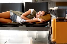 Airport bans people from lying down to sleep