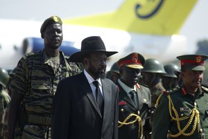 Salva Kiir, president of semi-autonomous South Sudan, waits to receive Omar al Bashir on his visit to the southern capital Juba