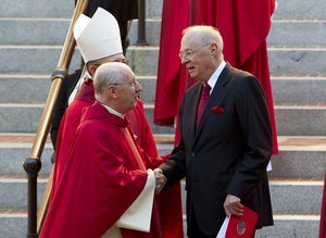 U.S. Supreme Court Justice Anthony Kennedy, is greeted by members of the clergy as he leaves St. Mathews Cathedral after the Red Mass in Washington on Sunday, Oct. 1, 2017. The Supreme Court's new term starts Monday, Oct. 2.