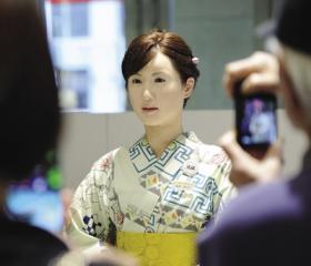 Robots Japan: Aiko Chihira, a humanoid robot that can blink and speak developed by Toshiba Corp, staffs the information desk of a high-end department store in Tokyo. 