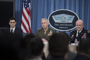 File - From left, Assistant Secretary of Defense for International Security Affairs Robert S. Karem; Marine Corps Gen. Thomas D. Waldhauser, commander of U.S. Africa Command; and Army Maj. Gen. Roger L. Cloutier Jr., Africom’s chief of staff and the investigating officer for the Army Regulation 15-6 investigation into the Oct. 4, 2017, attack in Niger, brief the Pentagon press corps on the results of the investigation, May 10, 2018.