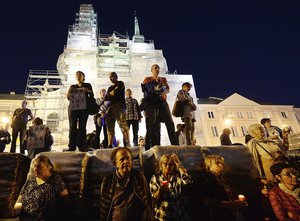 Crowds protesting the forced retirement of the Supreme Court head, Małgorzata Gersdorf, and of some of its judges as part of a judicial overhaul implemented by Poland's right-wing ruling party, that has put it at odds with the European Union, before the Supreme Court building in Warsaw, Poland, Tuesday, July 3, 2018.