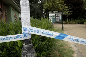 Police tape cordons off the Queen Elizabeth Gardens park in Salisbury, England, Wednesday, July 4, 2018. British police have declared a