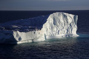 An iceberg floats in Baffin Bay in the Canadian Arctic Archipelago, Tuesday, July. 25, 2017.