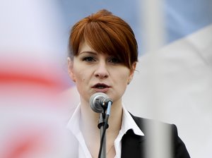 In this photo taken on Sunday, April 21, 2013, Maria Butina, leader of a pro-gun organization in Russia, speaks to a crowd during a rally in support of legalizing the possession of handguns in Moscow, Russia.