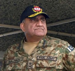 In this Wednesday, Nov. 16, 2016 photo, Pakistan's army senior officer Lt. Gen. Qamar Javed Bajwa attends a military exercise in Khairpur Tamiwali, Pakistan.