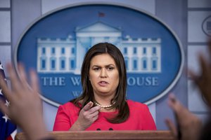 White House press secretary Sarah Huckabee Sanders calls on a member of the media during the daily press briefing at the White House, Wednesday, July 18, 2018, in Washington.