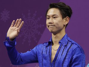 FILE - In this Feb. 16, 2018 file photo, figure skater Denis Ten, of Kazakhstan, reacts as his score is posted following his performance in the men's short program figure skating, in the Gangneung Ice Arena at the 2018 Winter Olympics in Gangneung, South Korea.