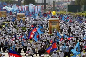 Cambodian People's Party supporters attend during their last campaign for the July 29 general election, in Phnom Penh, Cambodia, Friday, July 27, 2018.