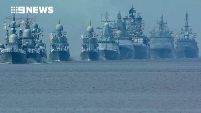 Russia navy parade: Putin flexes military muscle and showcases 'carrier killer' sub