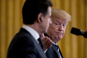 President Donald Trump, gestures towards Italian Prime Minister Giuseppe Conte, left, during a news conference in the East Room of the White House, Monday, July 30, 2018, in Washington.