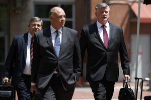 The defense team for Paul Manafort, including Kevin Downing, right, Thomas Zehnle, center, and Richard Westling walk to the Albert V. Bryan United States Courthouse during the trial of the former Trump campaign chairman, Friday, Aug. 10, 2018, in Alexandria, Va. (AP Photo/Evan Vucci)