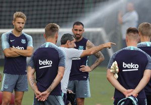 Ernesto Valverde gestures during a training session in Sant Joan Despi, Tuesday, Aug. 7, 2018